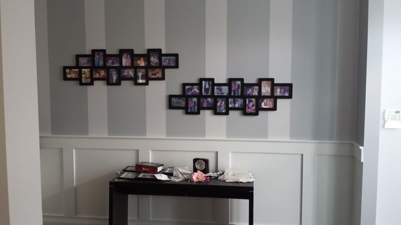 A striped feature wall in two tones of grey.
